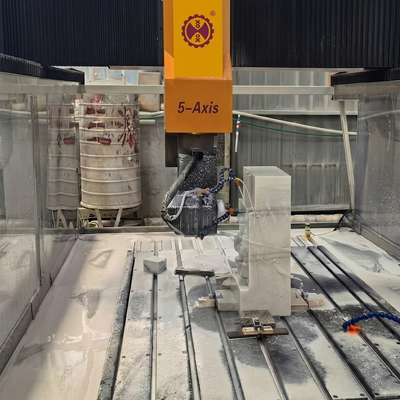 5 অক্ষের পাথর সিএনসি খোদাই মেশিন 7.5KW ভারী-ডুয়ি স্পিন্ডল এবং 3000 × 1300 মিমি প্রসেসিং টেবিলের সাথে ওমনি-ডাইরেকশনাল 3 ডি ক্যাভিংয়ের জন্য